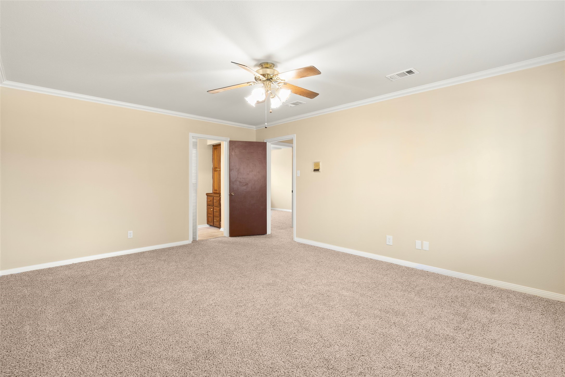 View showing entry to hallway and bathroom.