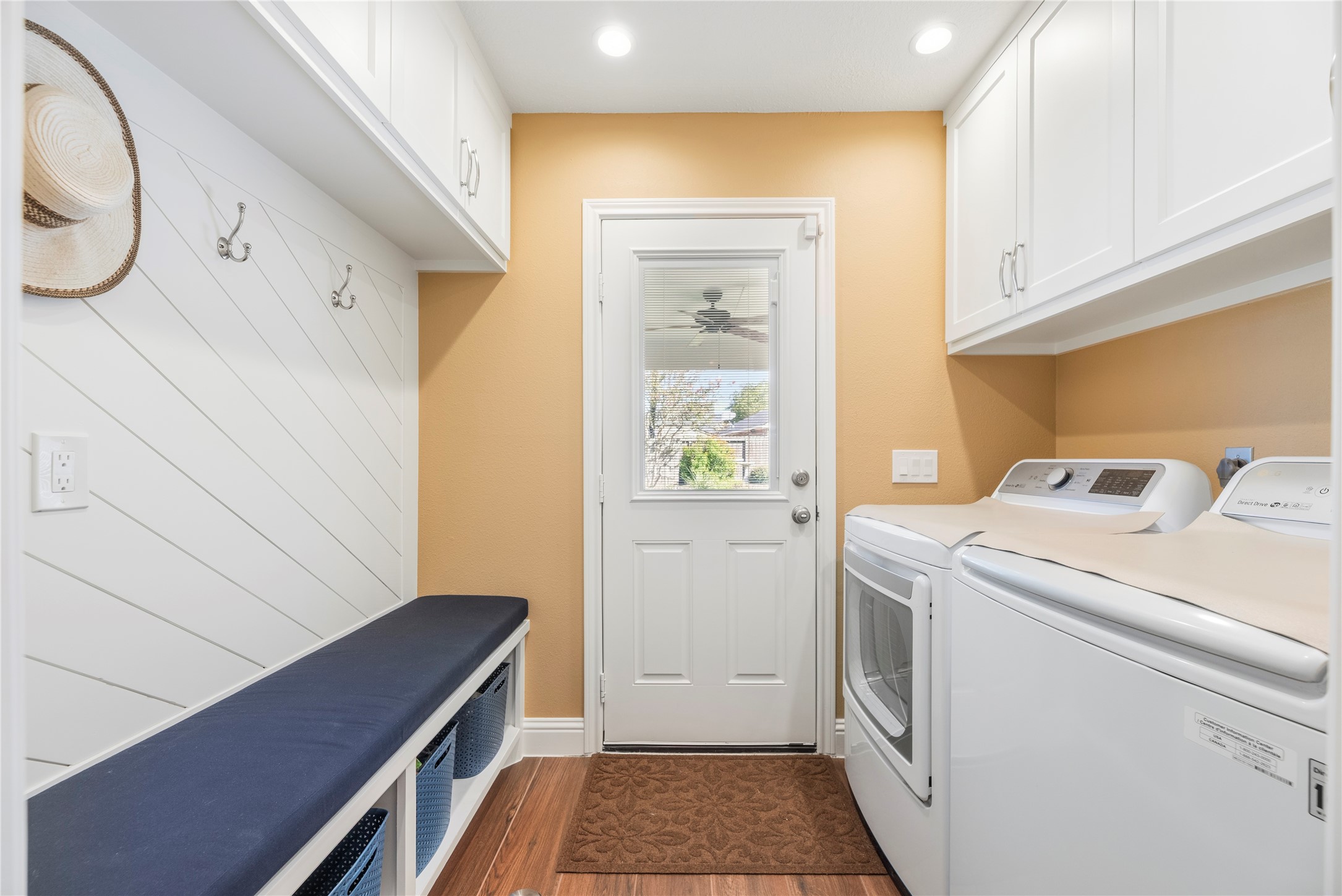 The utility room has a mud area and additional storage.