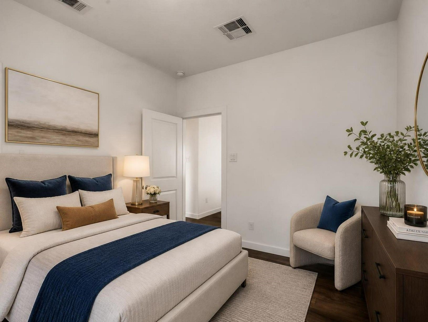 This bedroom shows the rooms scale, closet placement, and natural light with a clean setup. A flexible private space within the five-bedroom layout. Virtually staged.