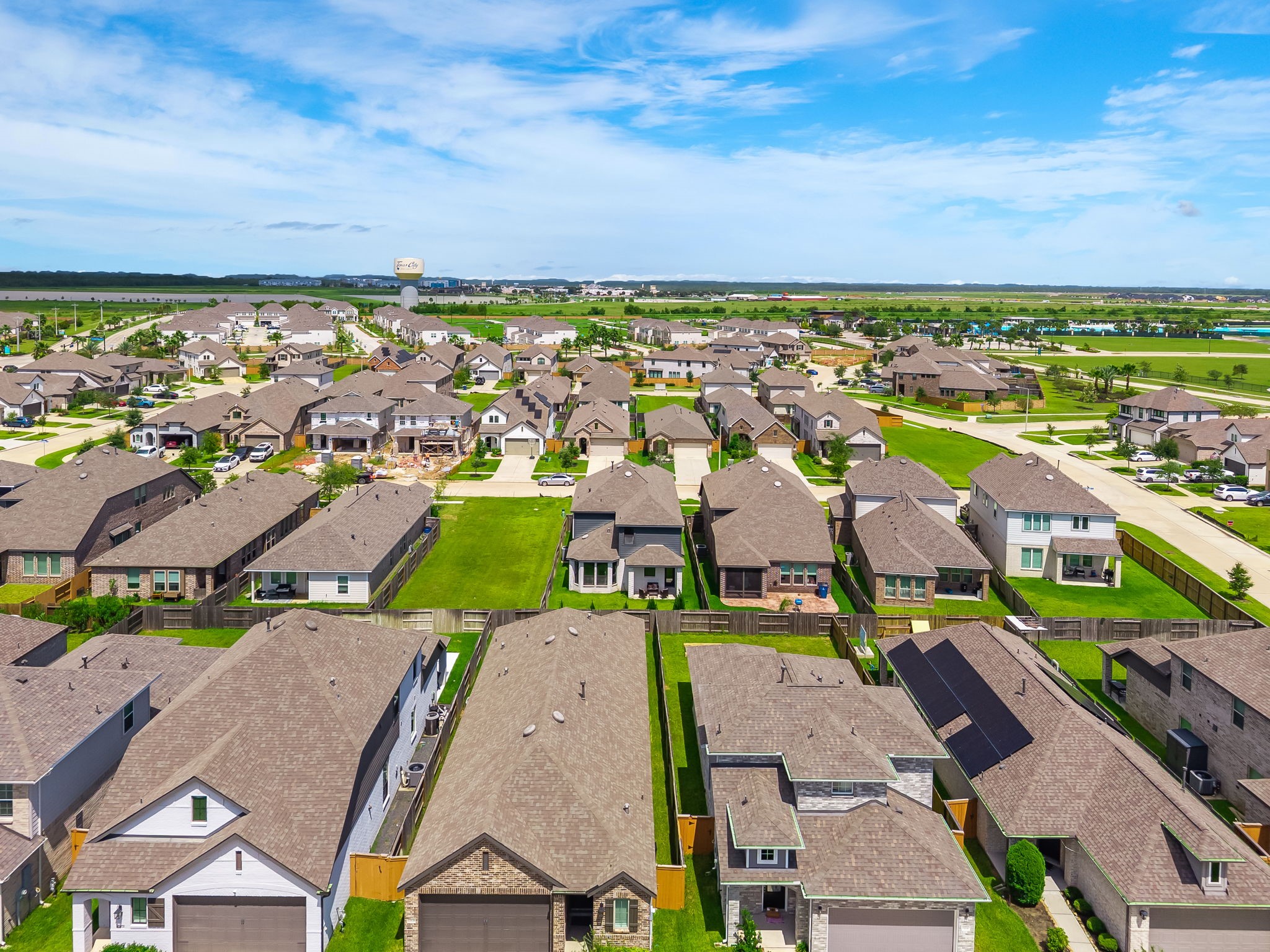 The wider aerial shows Lago Mars growing master-planned setting with broad neighborhood views. A final perspective on location, lifestyle, and community scale. Virtually staged.