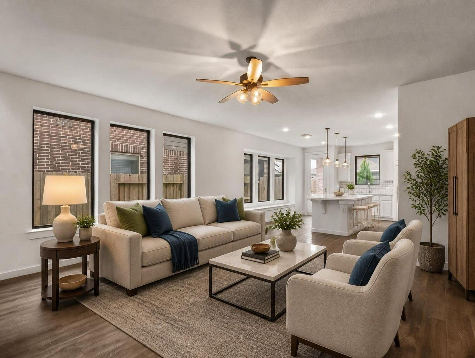 This view captures the living rooms scale, soft staging, and easy connection to the dining and kitchen areas. A calm, refined main gathering space. Virtually staged.