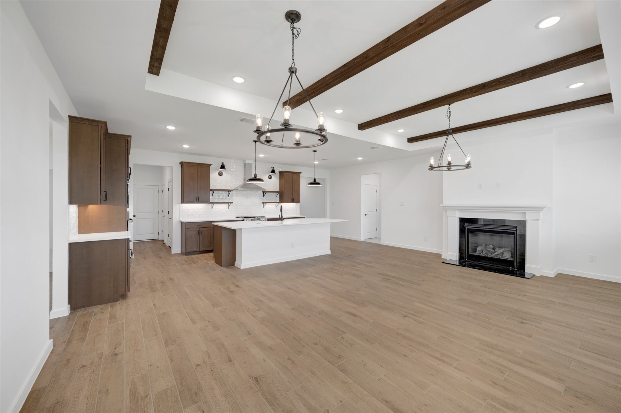 Impressive living area with decorative stained beams on the ceiling