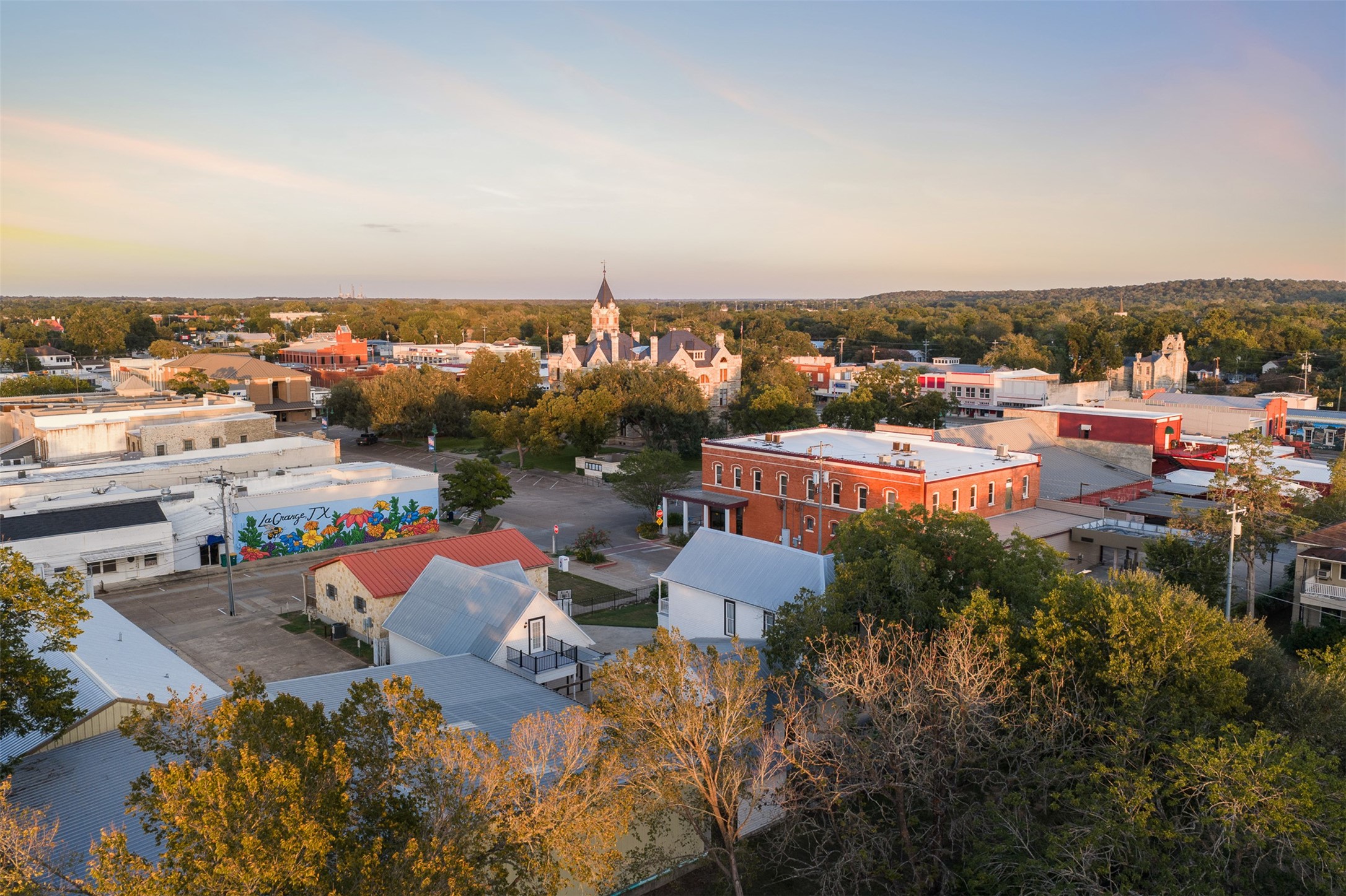 Historic La Grange unfolds just beyond the property, with the courthouse square, shops and local landmarks nearby.