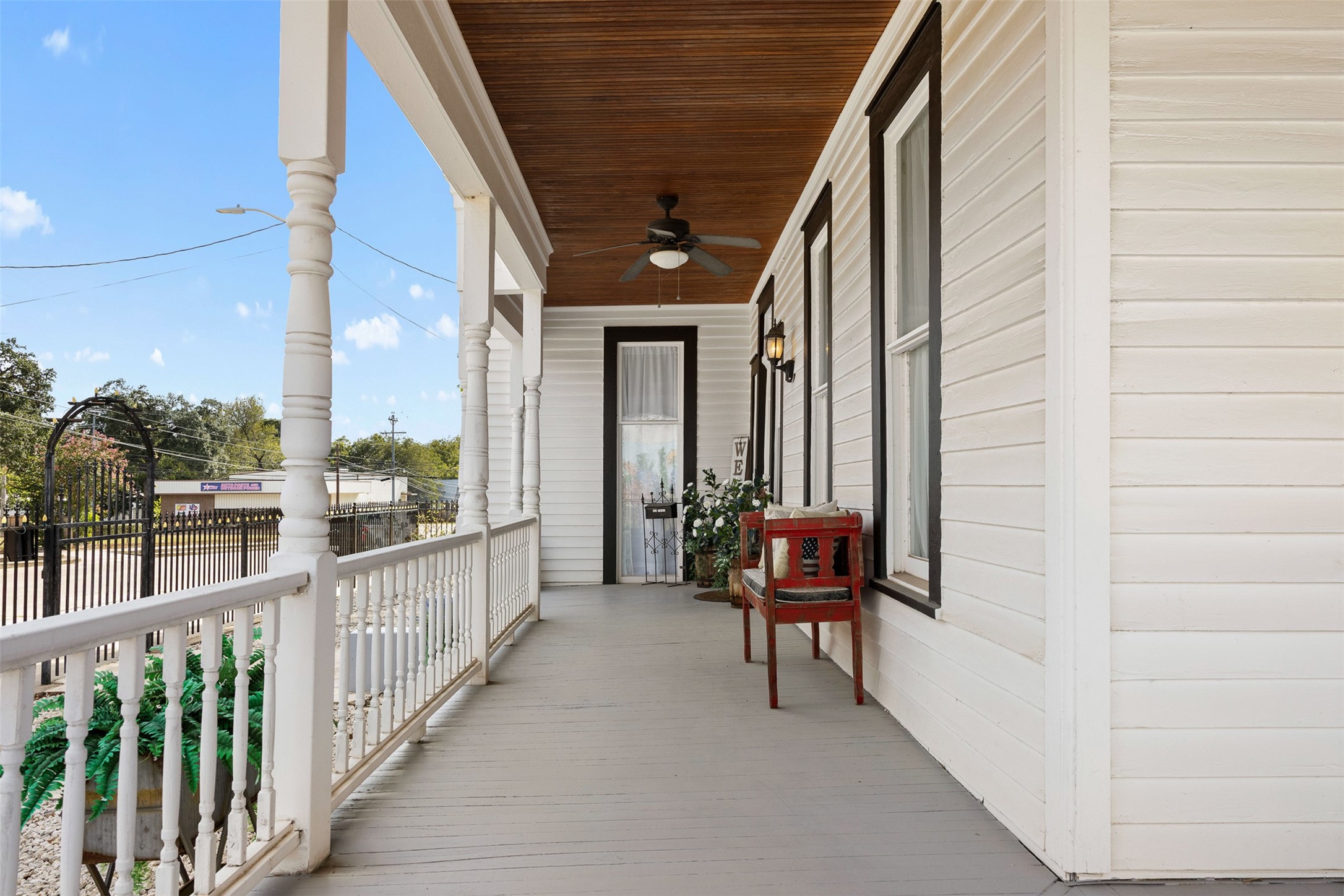The expansive porch offers a beautiful place to enjoy fresh air and views toward downtown La Grange.