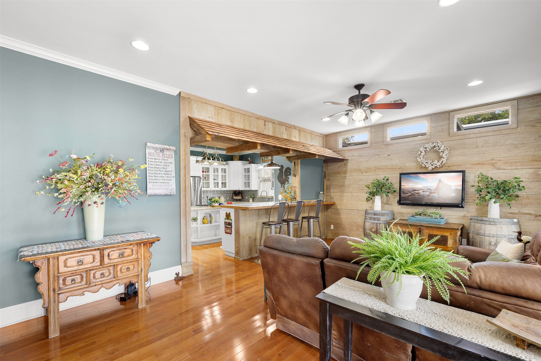 The light-filled family room blends historic warmth with an easy, open flow for everyday living and entertaining.