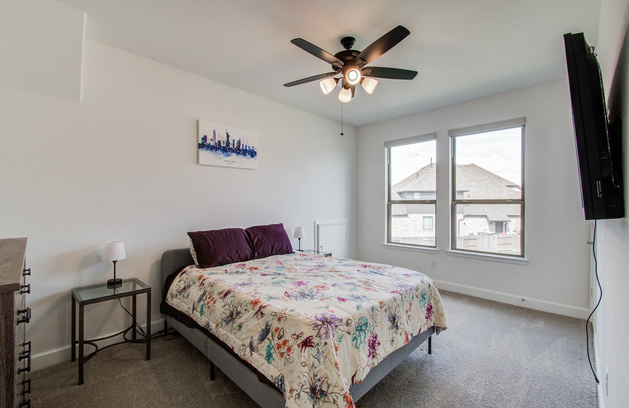 Roller shades and ceiling fan.  secondary bedroom up.