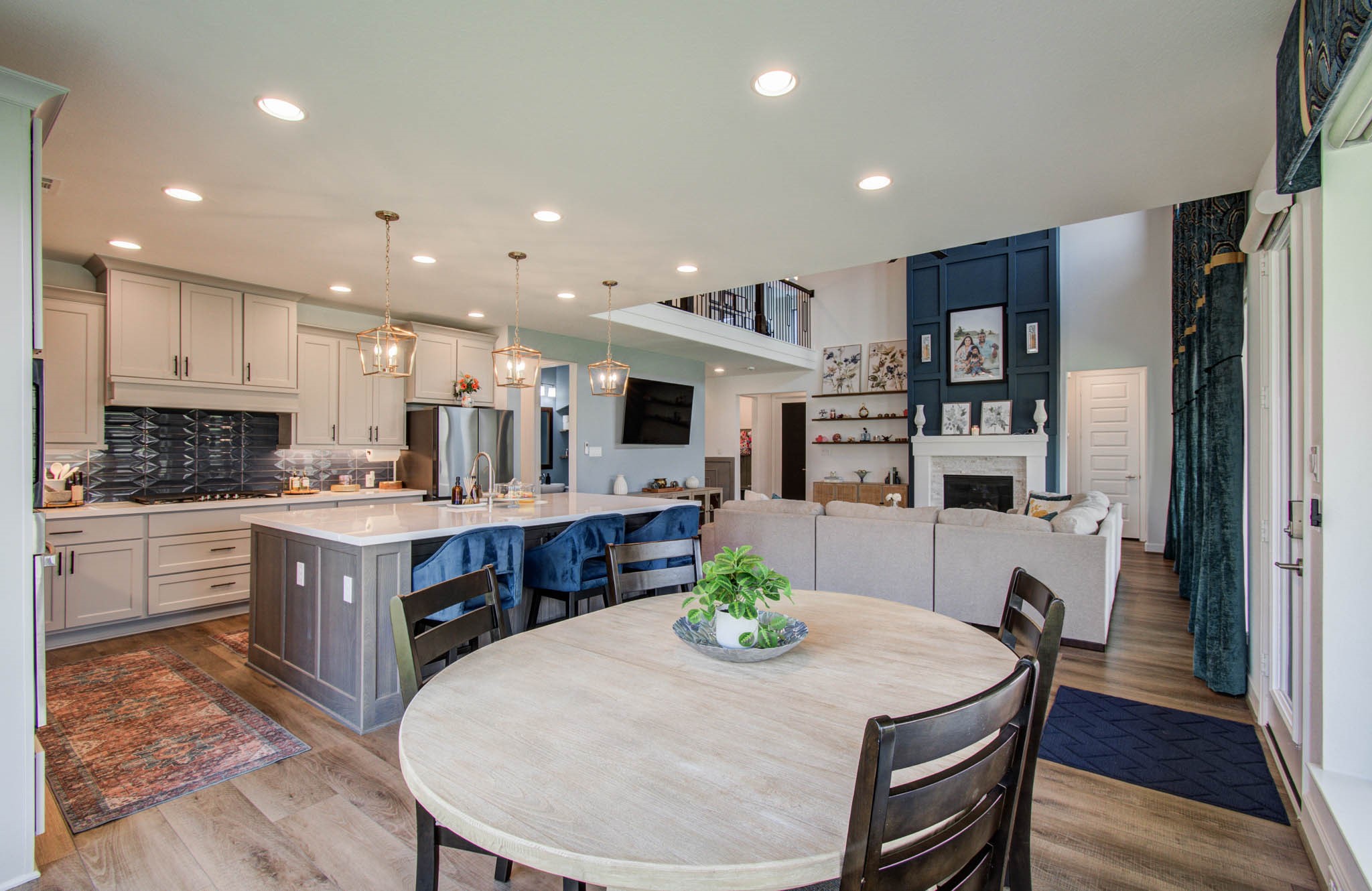 Experience the perfect blend of style and warmth in this inviting morning area, featuring an open-concept kitchen and living space with elegant finishes and abundant natural light.