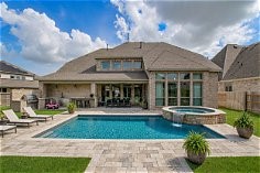 AI generated pool and outdoor kitchen showing  the room possible for a pool area with the large 12,216 sq foot yard.