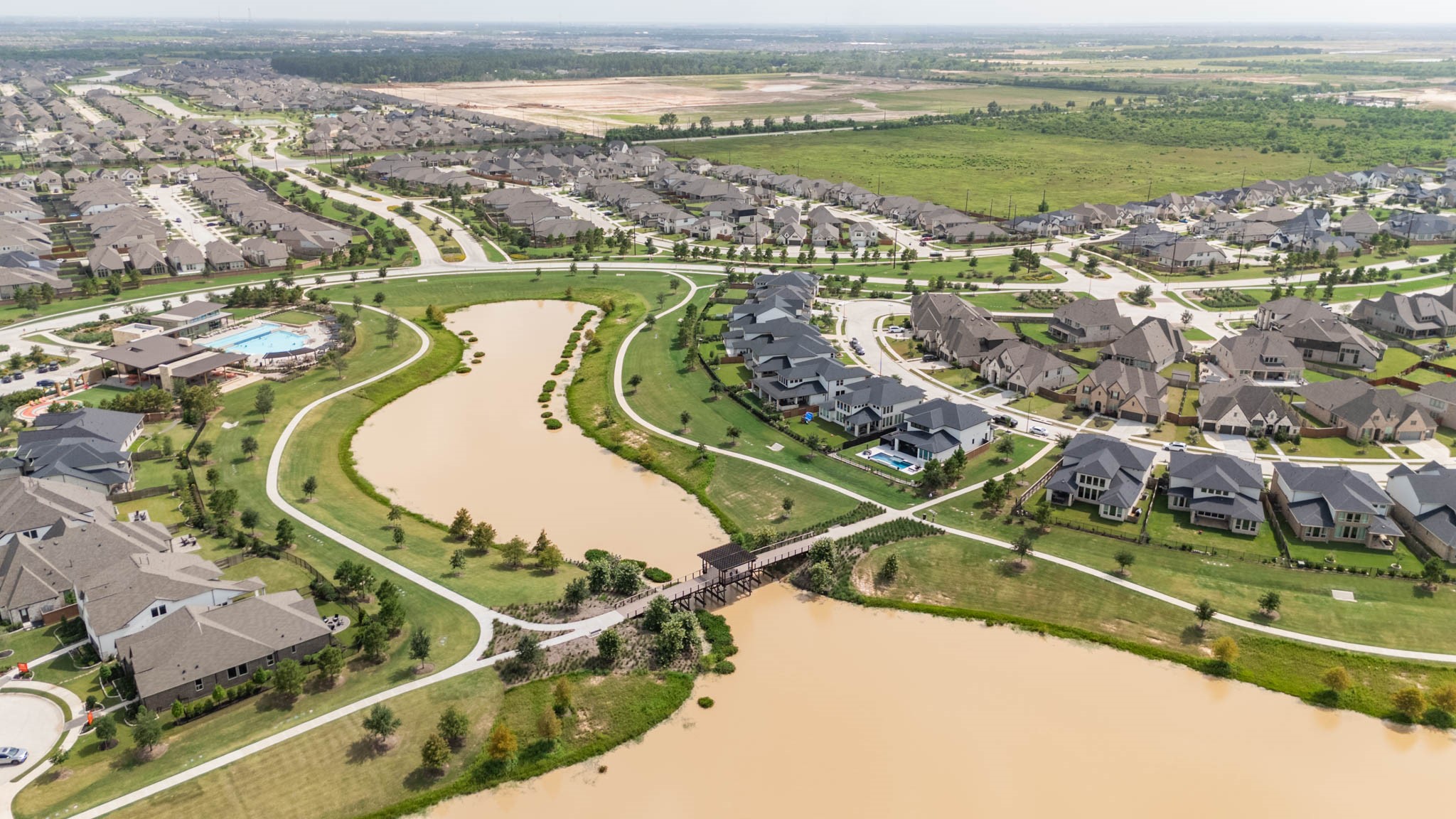 Experience the perfect blend of tranquility and community living in this master planned neighborhood, featuring scenic waterways, lush green spaces, and beautifully designed homes.