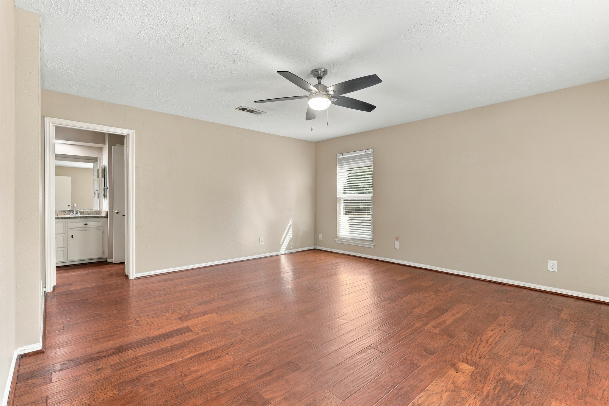 Upstairs is where we find the Primary Bedroom