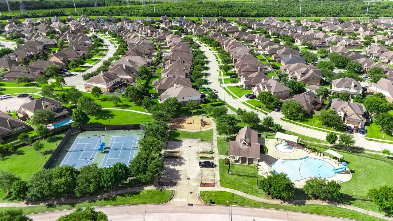 Walking distance - One of the community pools, club house and tennis/pickle ball courts.