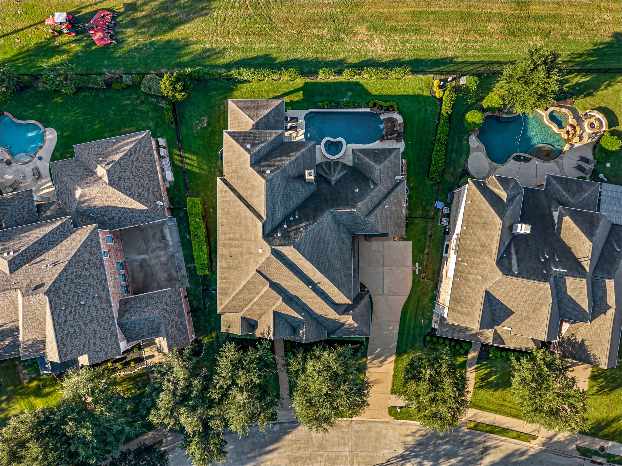 Aerial view of the expansive home with no back neighbors.