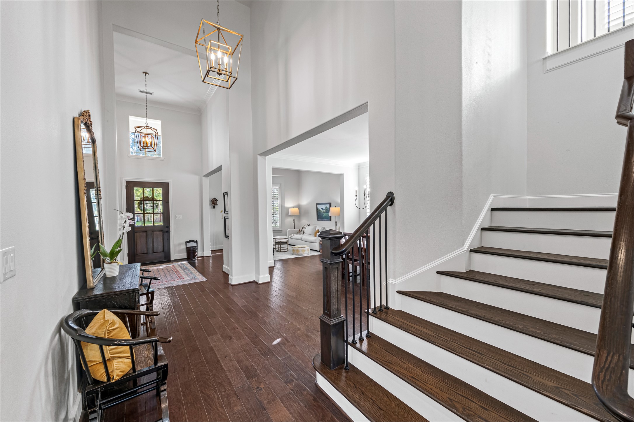 Sweeping staircase and soaring ceilings create an impressive first impression. Stairs redone (2020). All new lighting on dimmers.