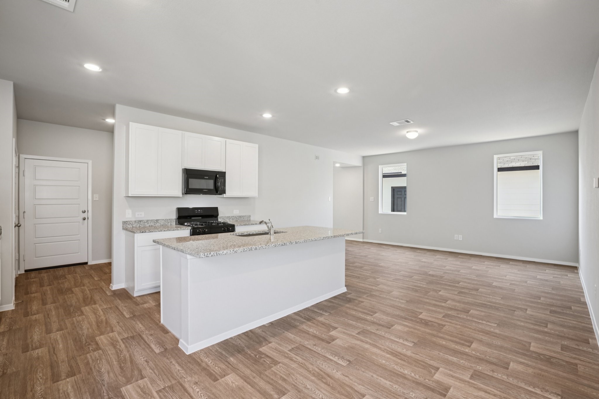 Dining room into kitchen representative photo