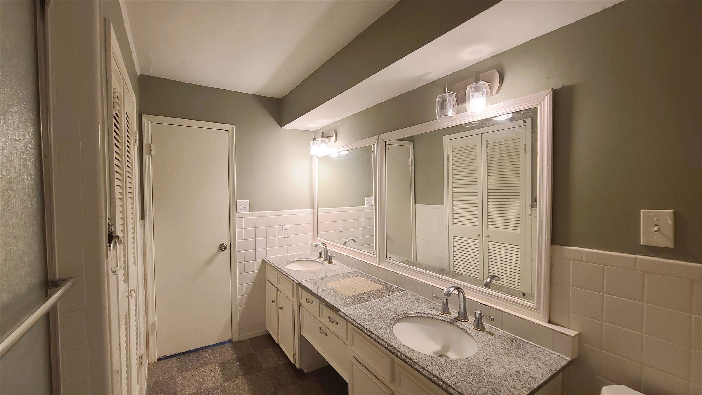 Secondary bath has double vanities