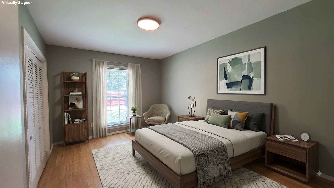 Experience the charm of this virtually staged bedroom, featuring elegant decor and a soothing ambiance that invites relaxation and style.