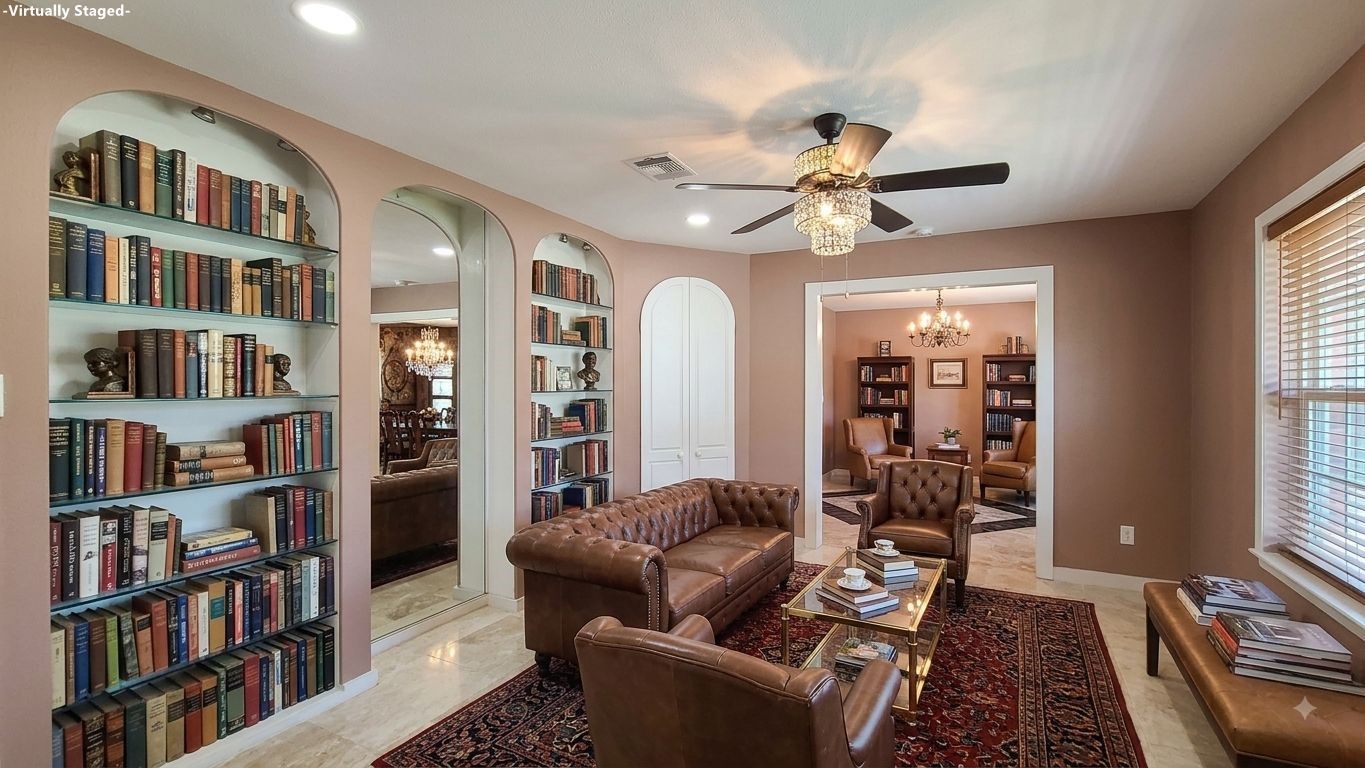 Elegant living room featuring striking tiled flooring and a classic chandelier, seamlessly connecting to the kitchen and other spaces, creating an inviting and versatile area for entertaining and relaxation.
