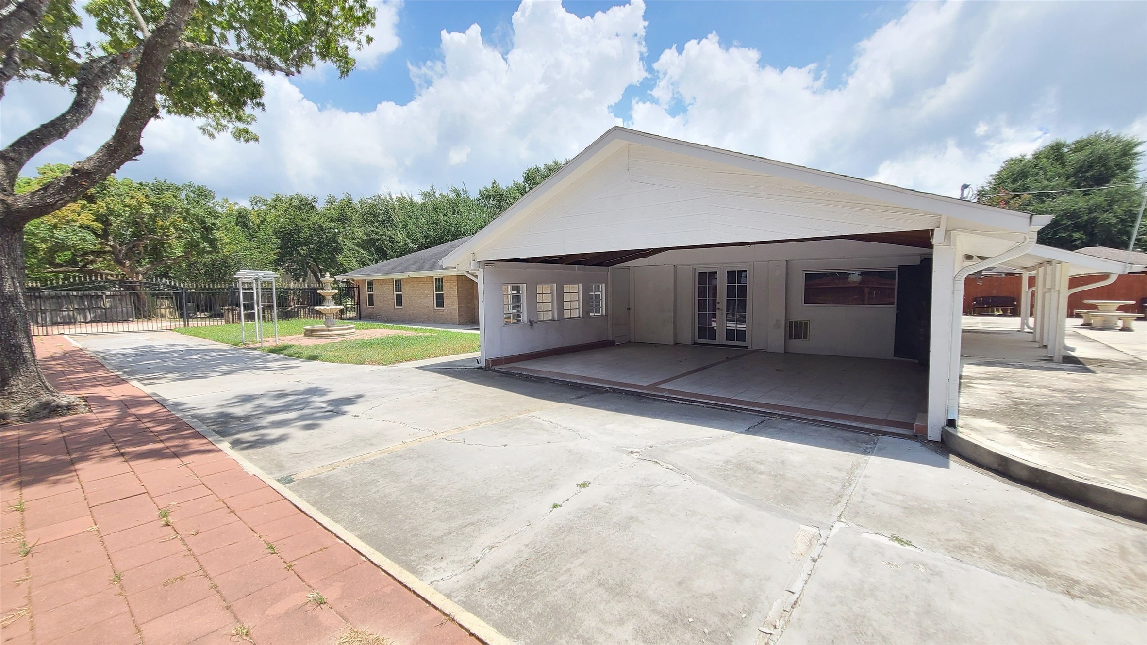 Experience convenience and style with this charming home, complemented by the practicality of a covered carport.