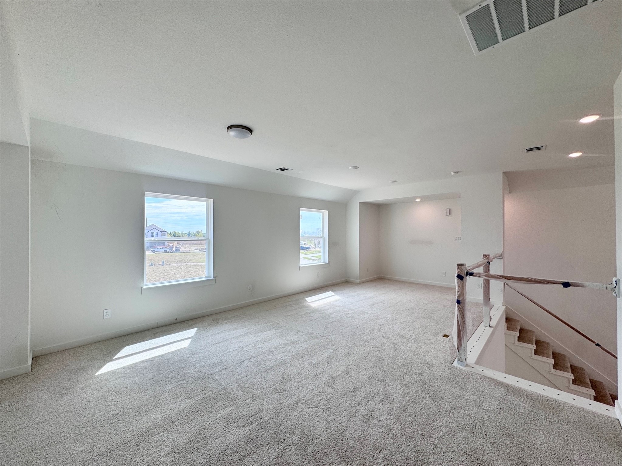 Space for a sectional, additional play area, desk and bench!