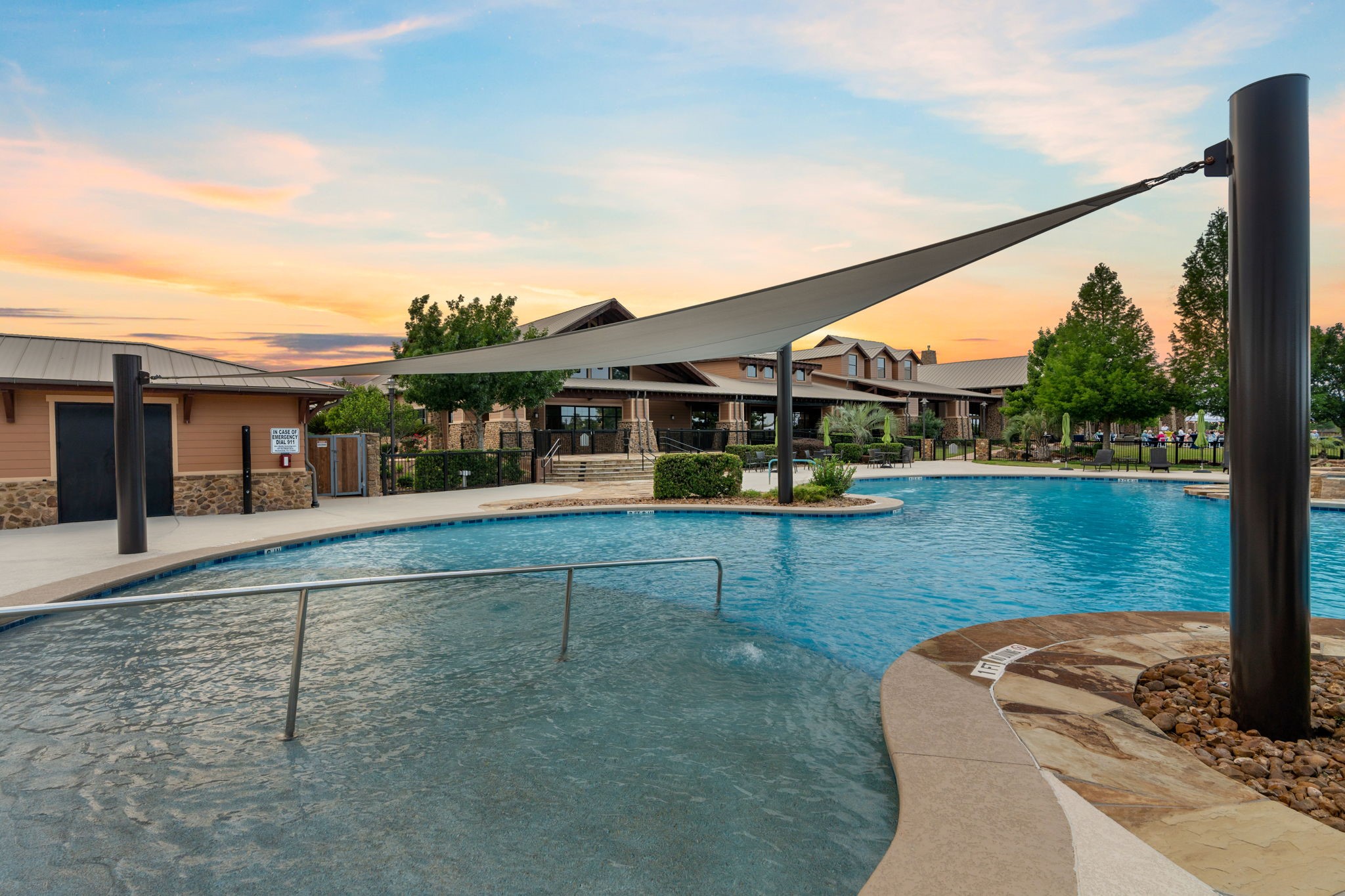 Soak up the sunshine at the Lakehouse's beautiful outdoor pool! Perfect for a refreshing dip, lounging poolside & enjoying the Del Webb lifestyle!