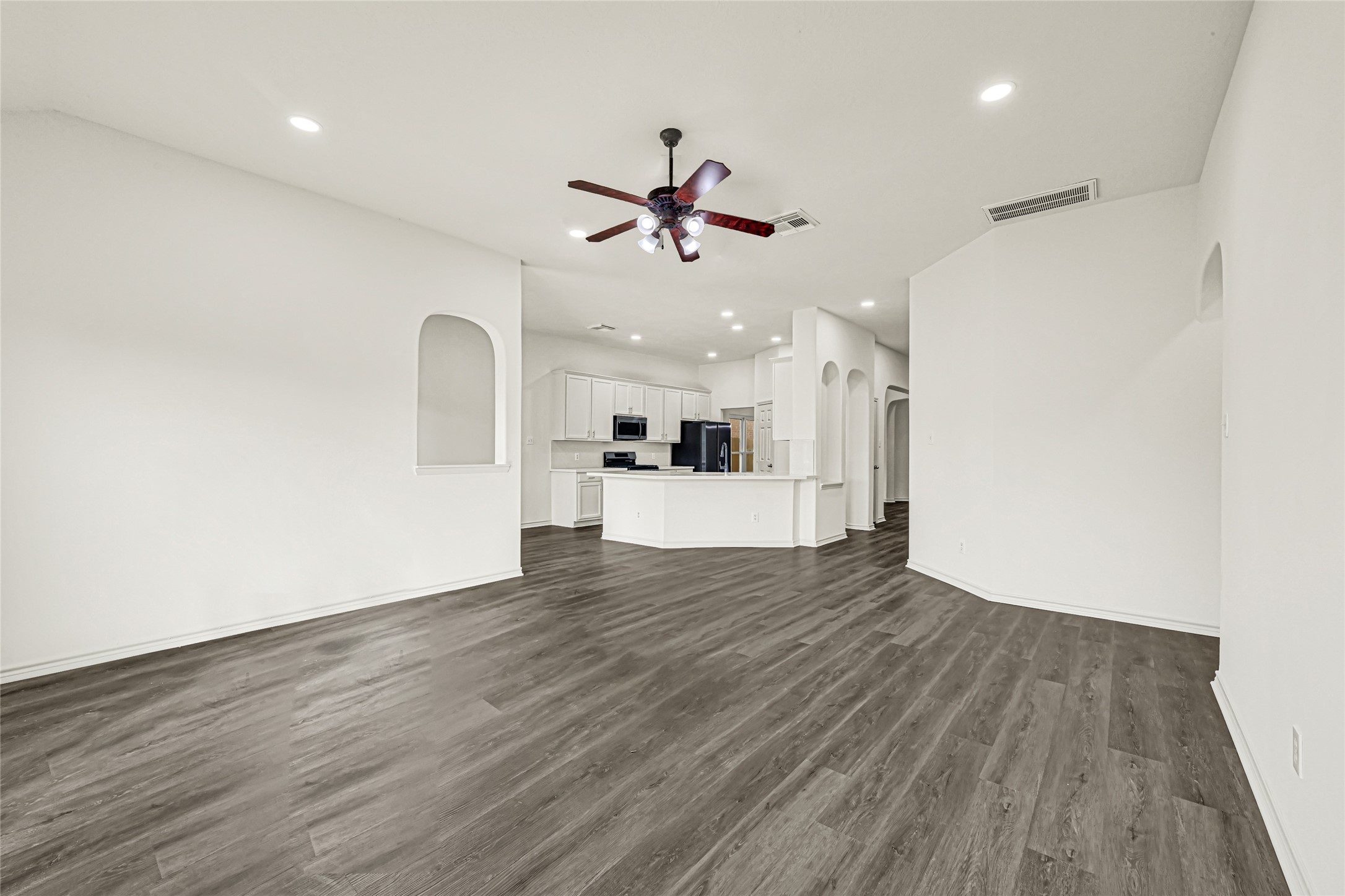 Family room with a view into the kitchen