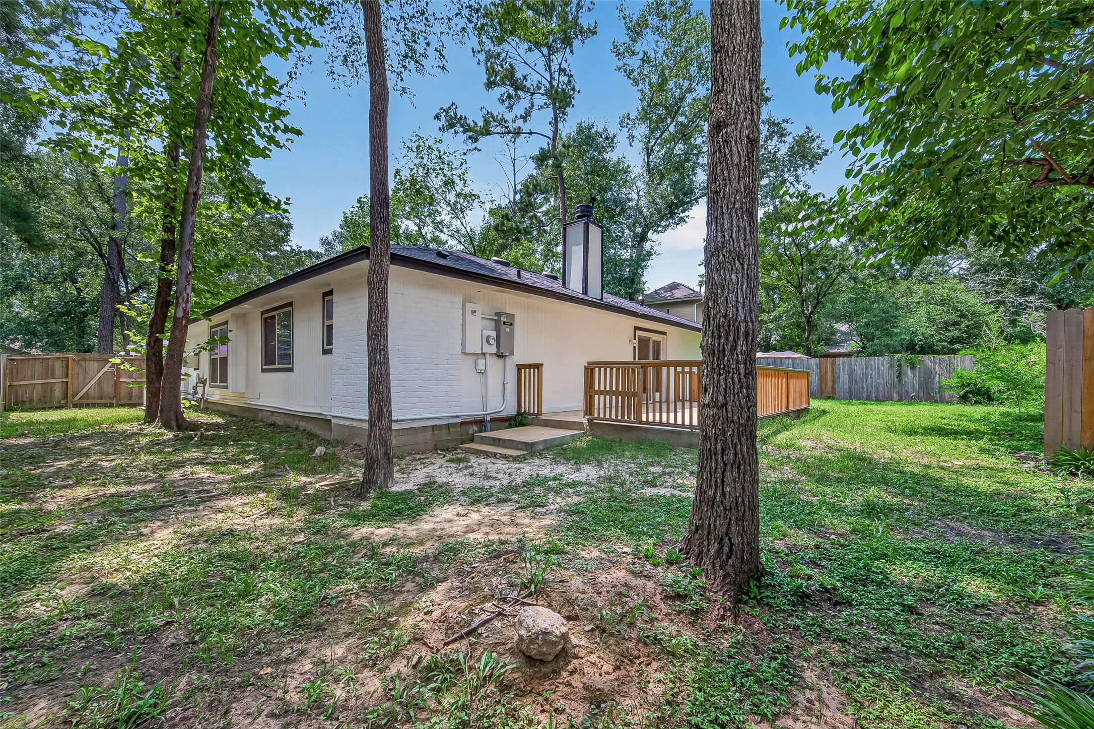 8 N Brook Pebble Court, The Woodlands, TX 77380