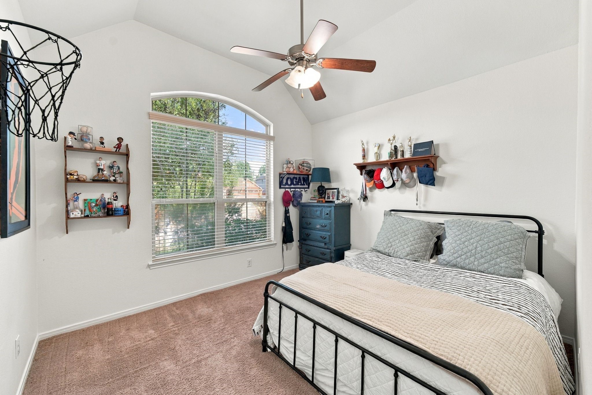 The first of two bedrooms (not including the primary) on the first floor.