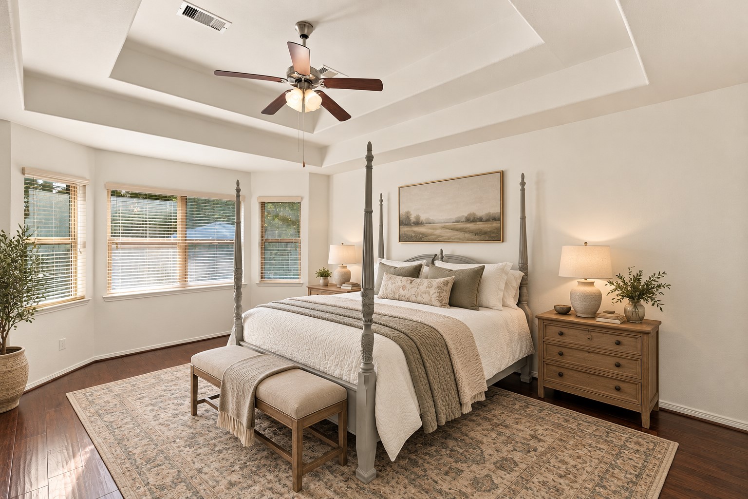 This photo has been digitally staged to show the space in this Primary Bedroom--located on the first floor with views of the pool.