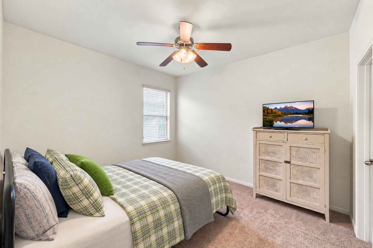 The second of two bedrooms (not including the primary) on the first floor.