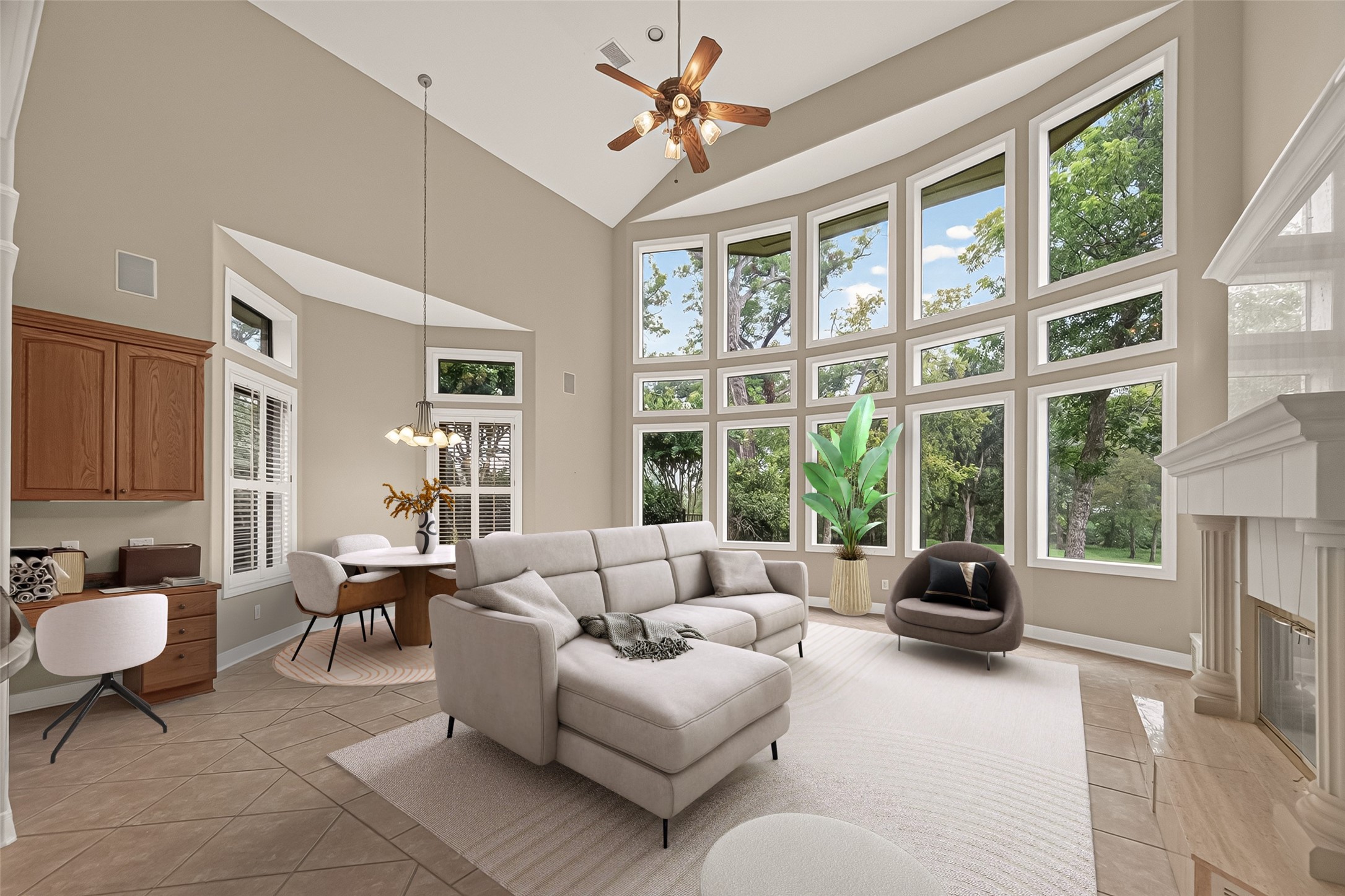 Stunning wall of windows in the Family Room. Virtually Staged.