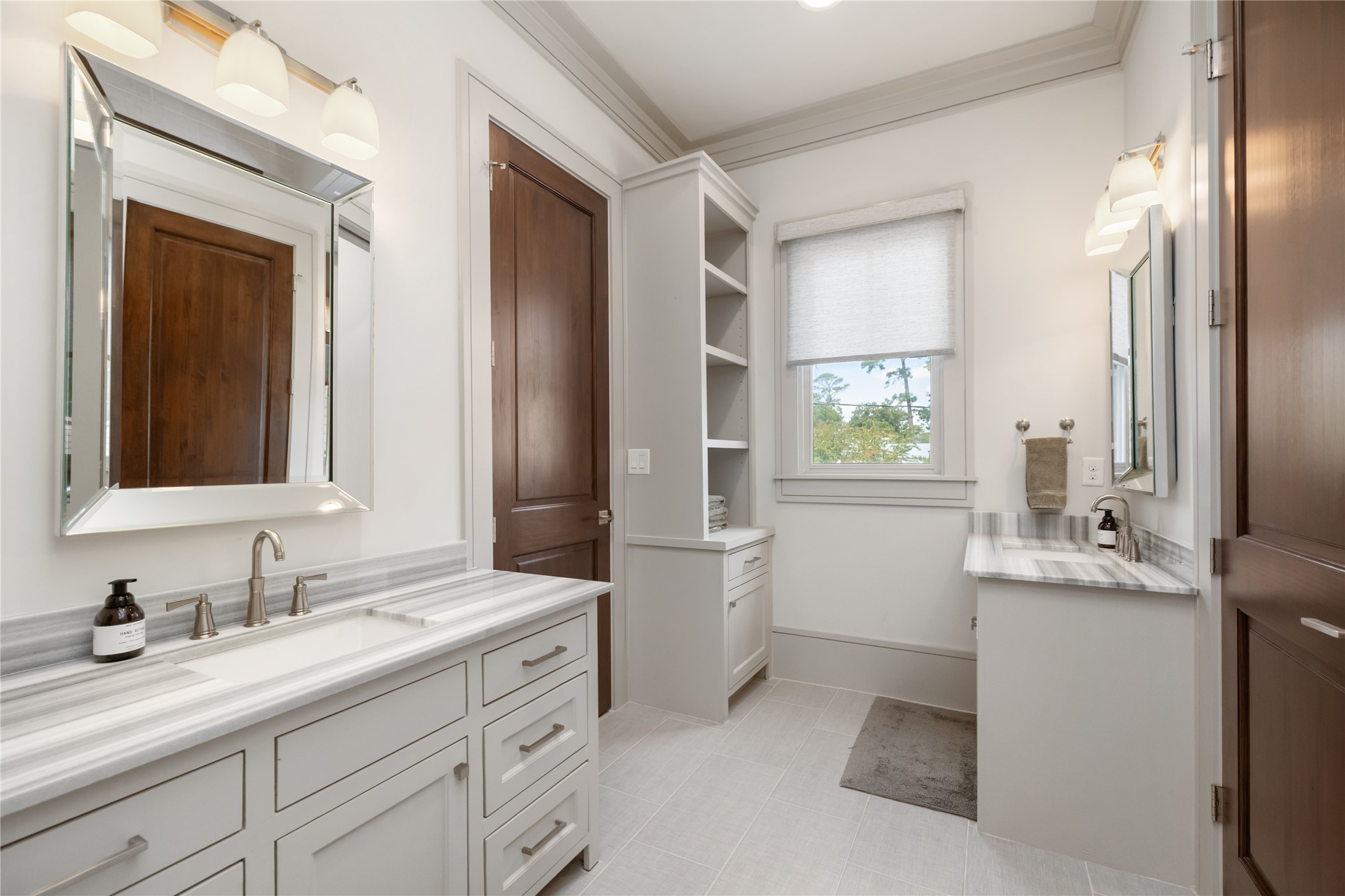 The bathroom between the third and fourth bedrooms