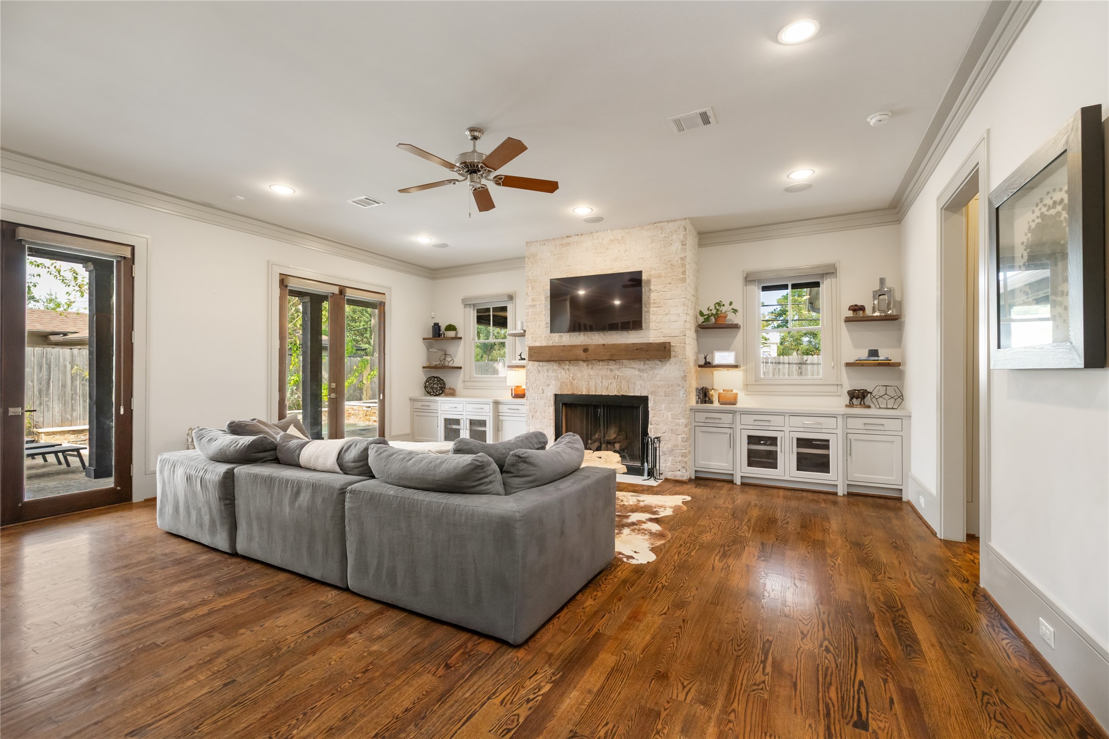 The Great Room is open to the kitchen and has doors that lead out to the backyard