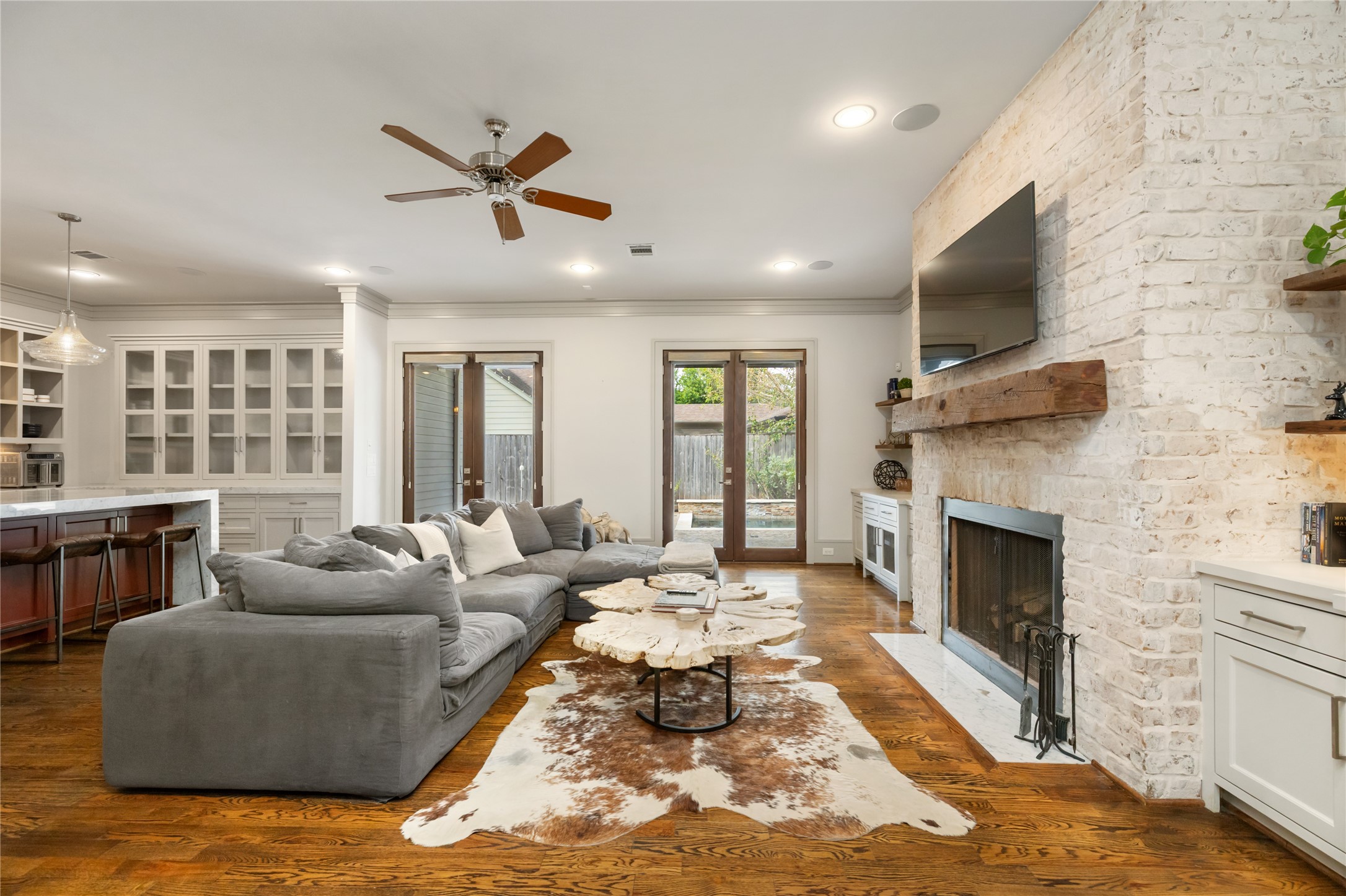 Relax by the beautiful stone wood burning fire place with gas igniter