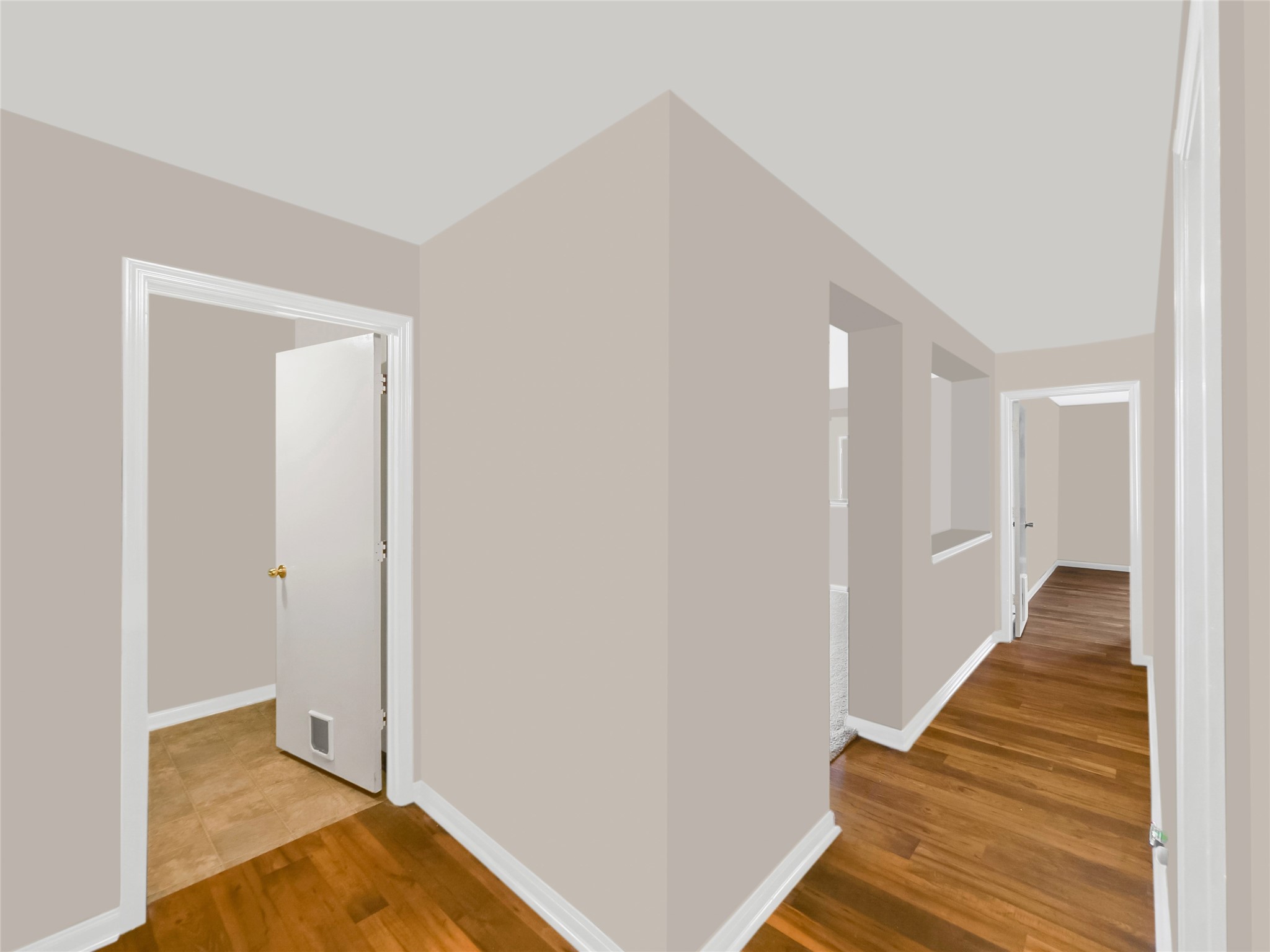 Interior hallway and doorways leading to adjacent rooms.