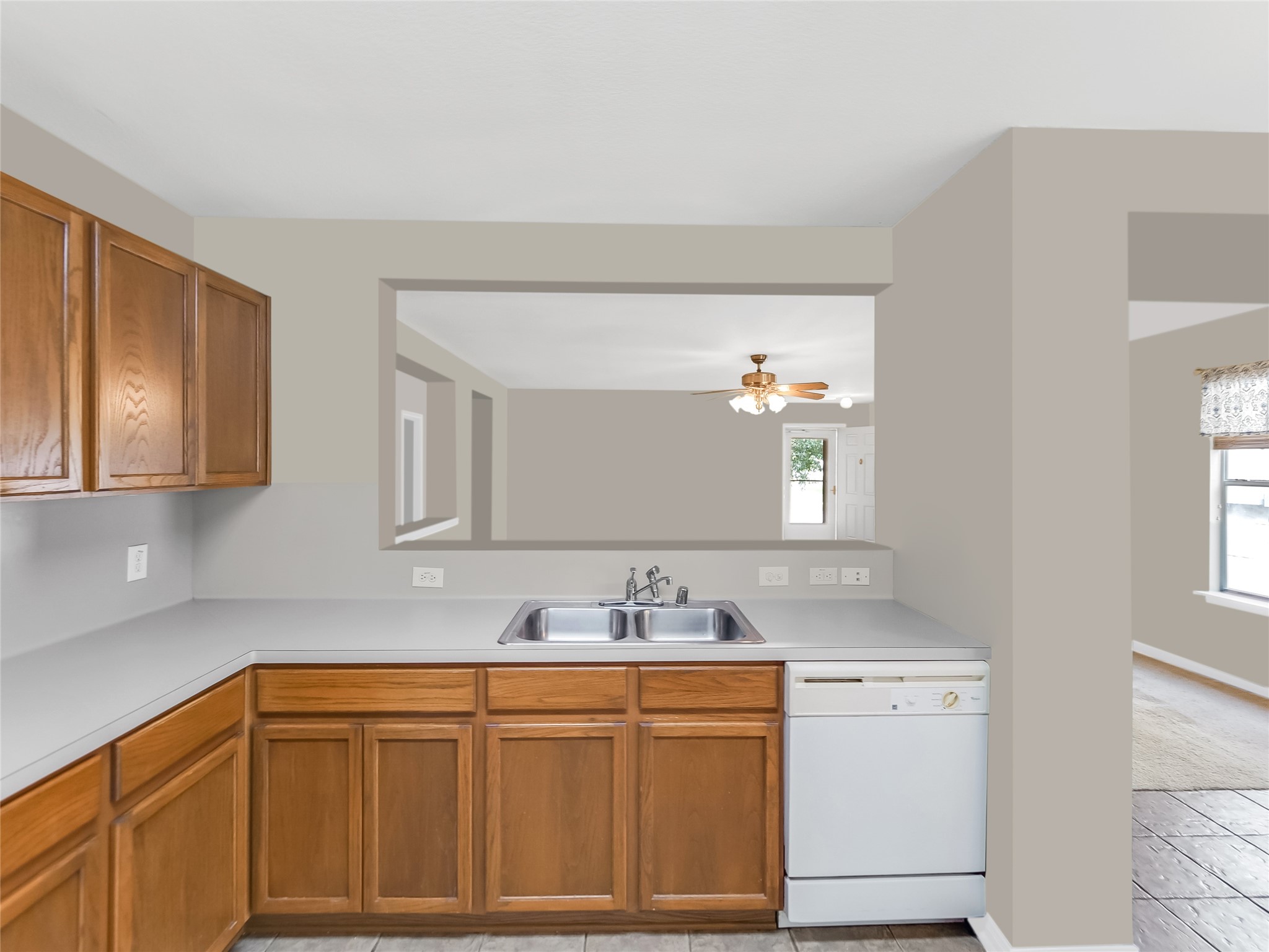 Kitchen and a breakfast bar overlooking the living area.