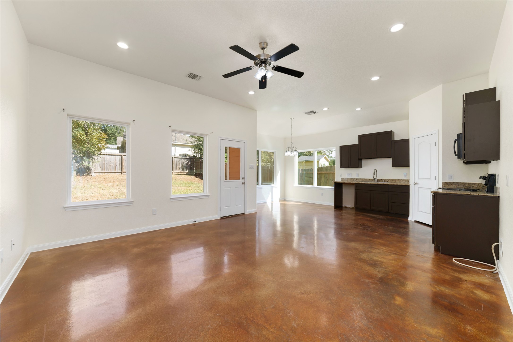 Open kitchen/living combo + Dining area view