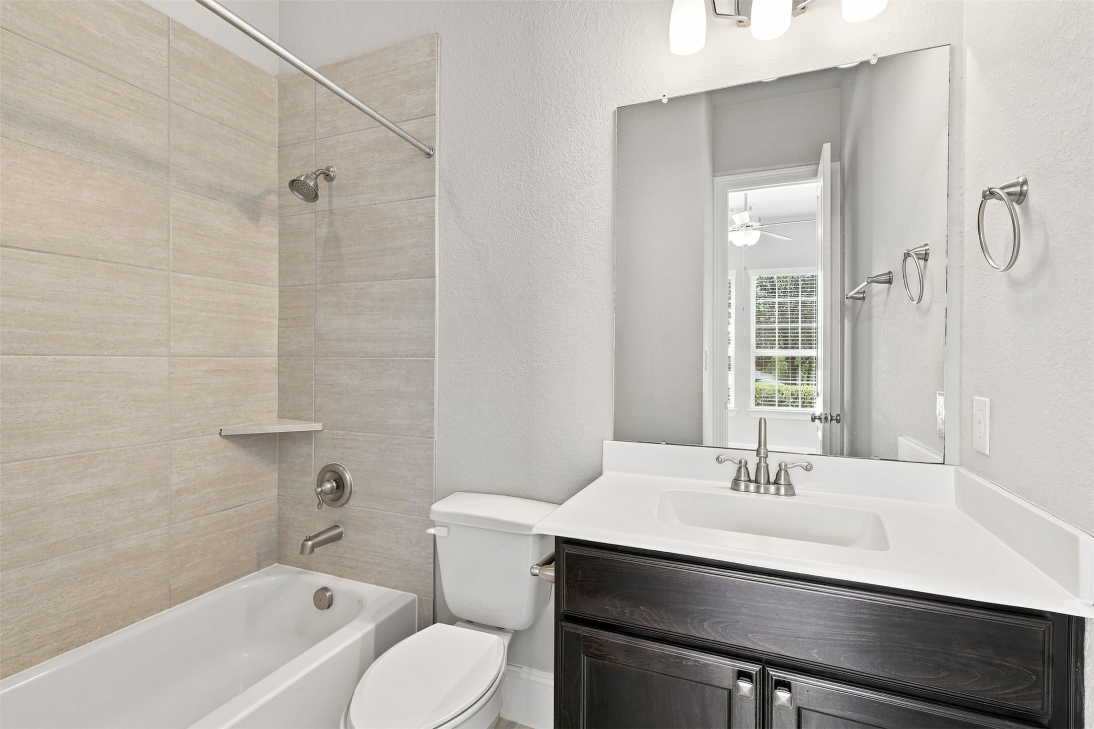 Full secondary ensuite bath in the main-level bedroom.