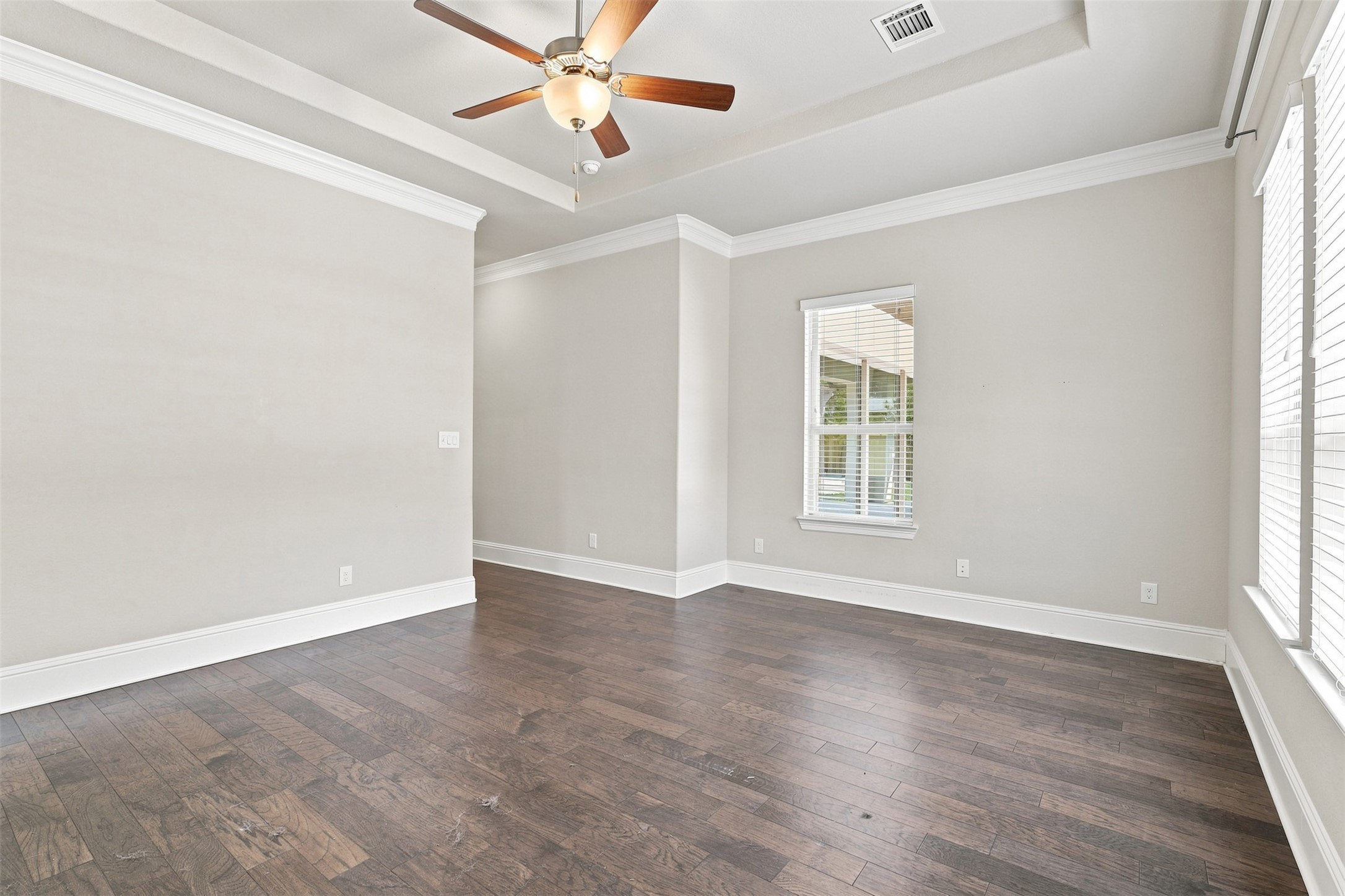The spacious primary retreat offers a peaceful escape with plenty of room to relax and unwind.