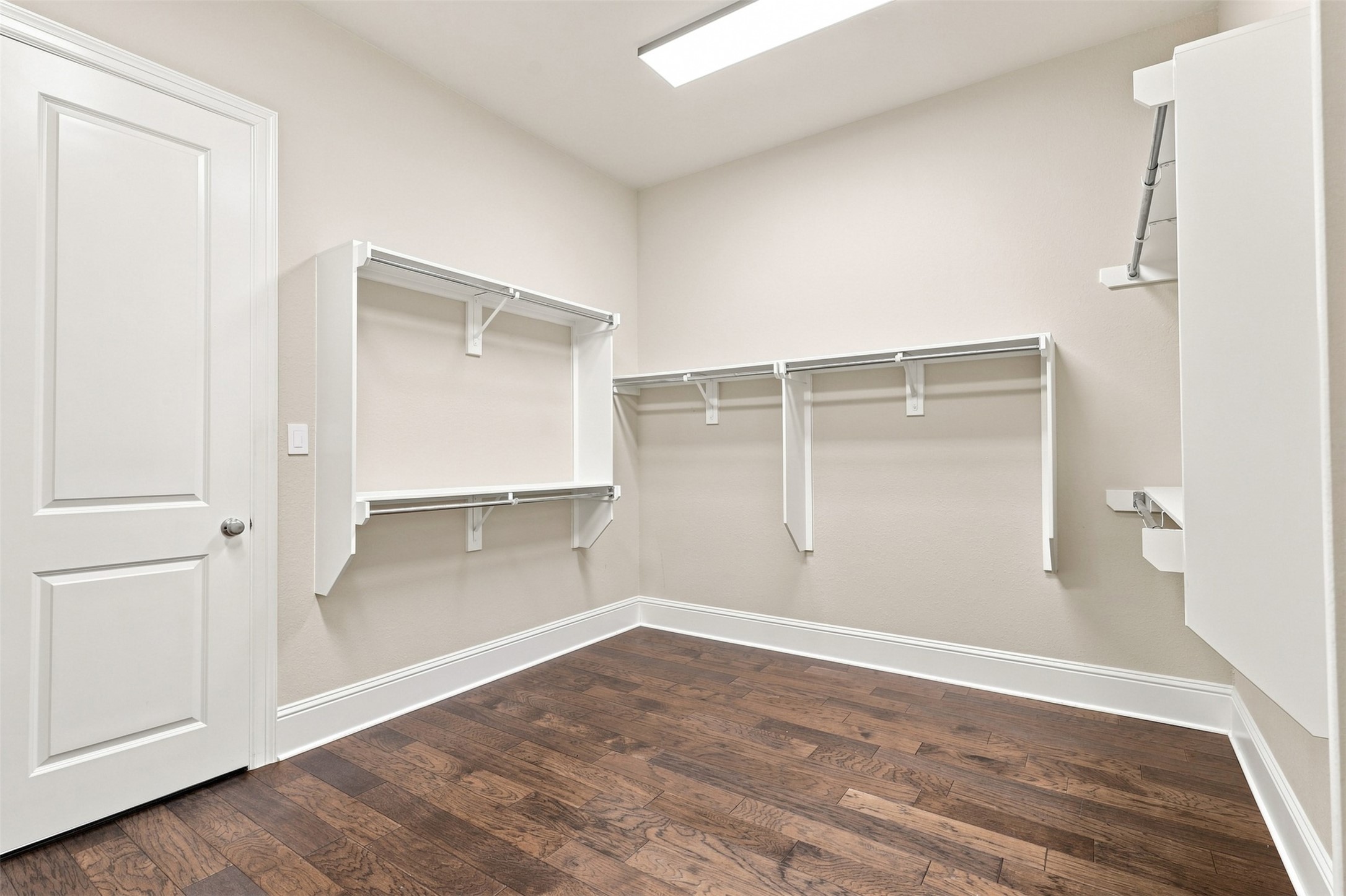 Generous primary closet offers abundant space for clothing, shoes, and everyday organization.
