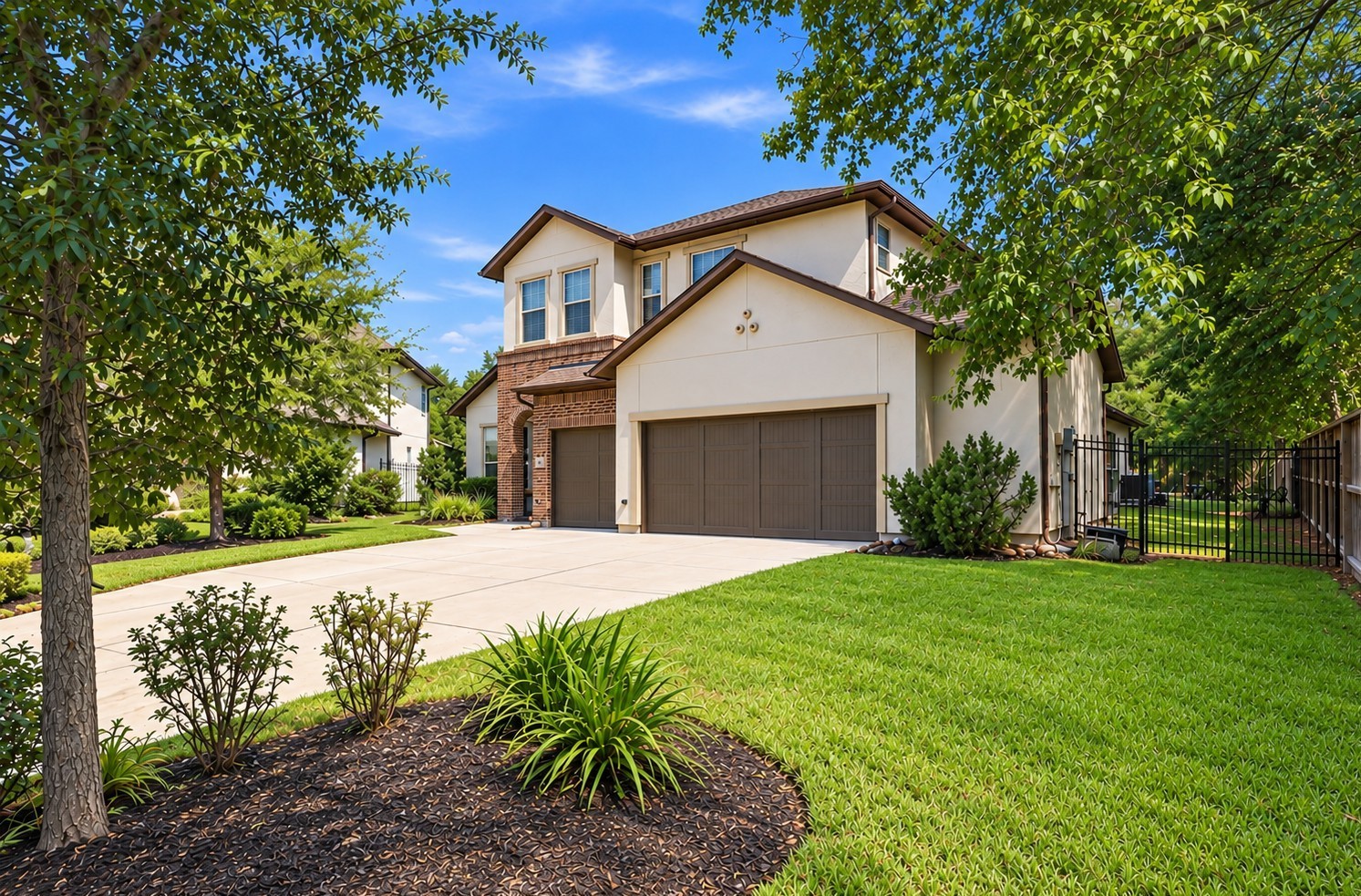 Welcoming exterior and a spacious three-car garage offering plenty of room for vehicles and storage.