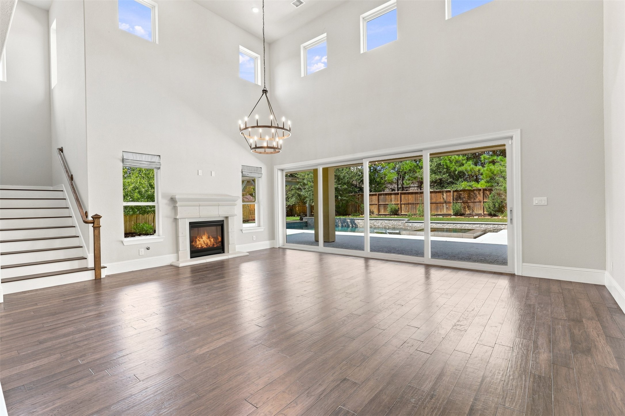 Living room and dining room overlooking the pool.