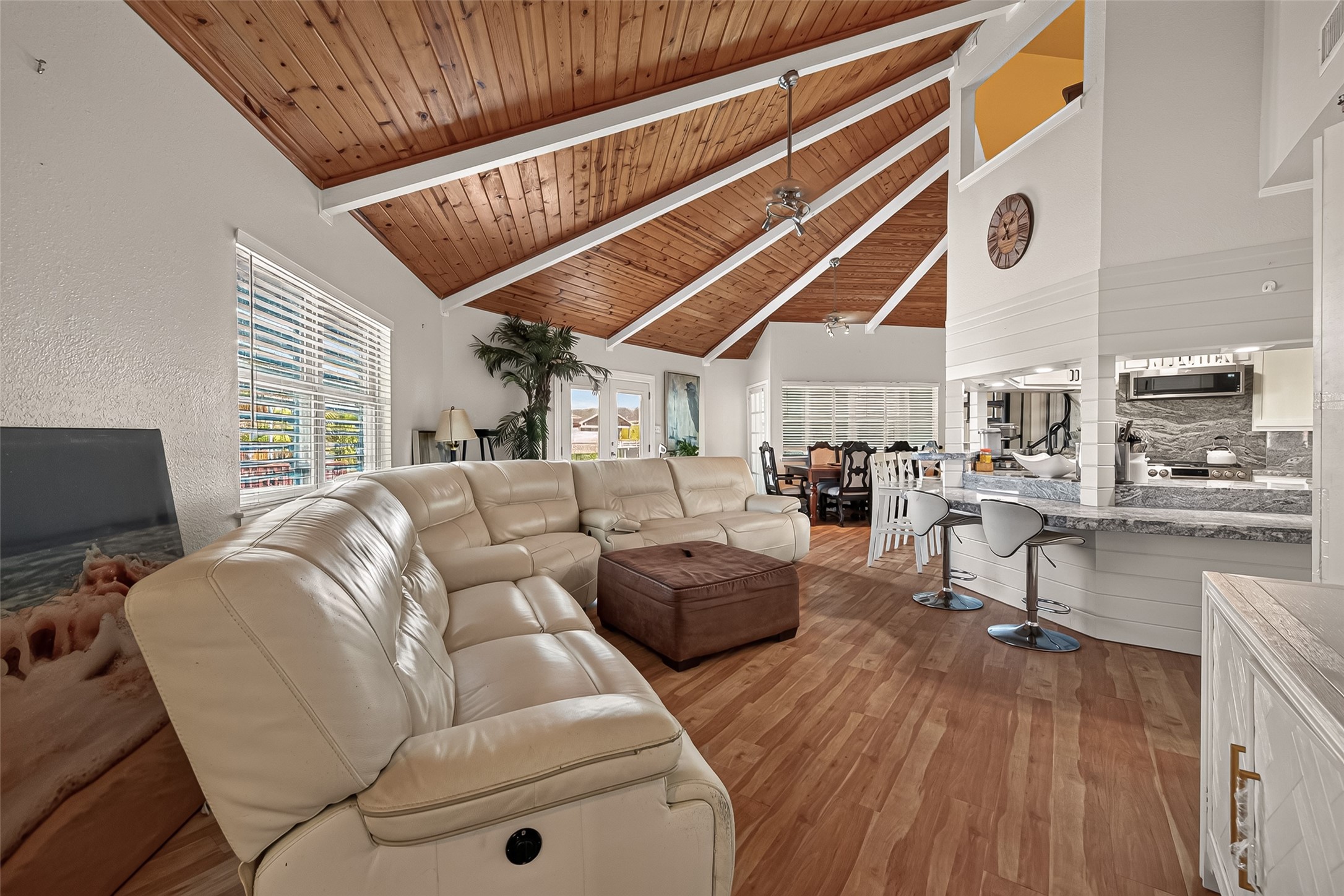 An architectural marvel featuring a dramatic multi-angled layout where a central kitchen, fluid seating, and dining areas harmoniously converge. An architectural marvel featuring a dramatic multi-angled layout where a central kitchen, fluid seating, and dining areas harmoniously converge.