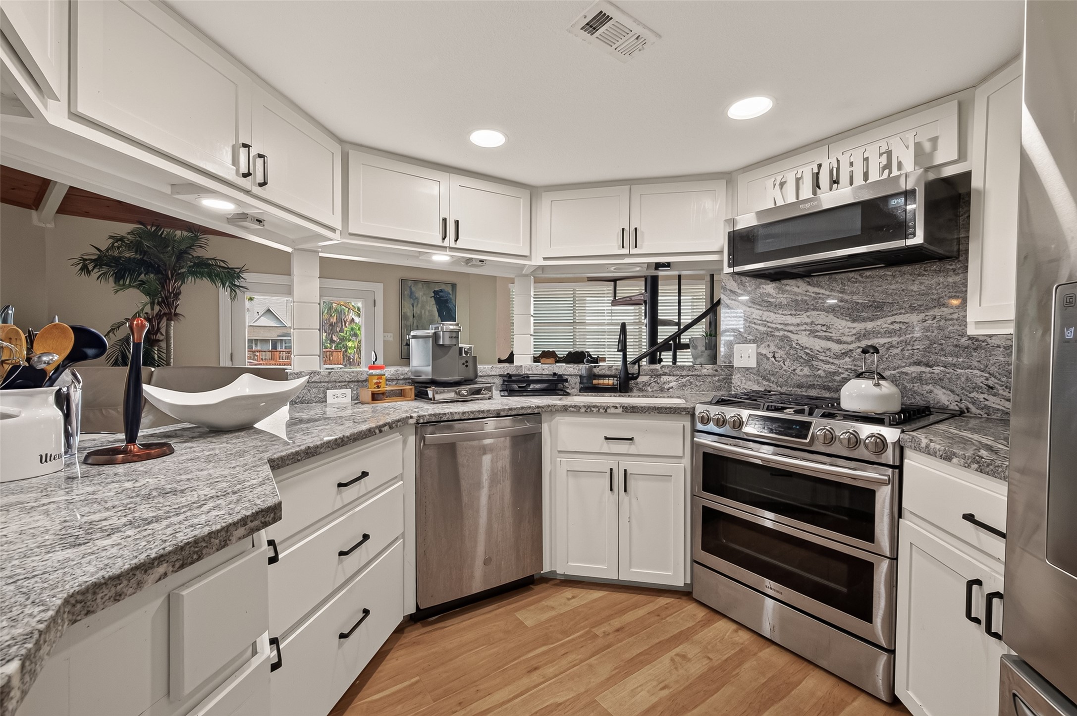 Function meets high design with abundant cabinet storage and generous counter space.