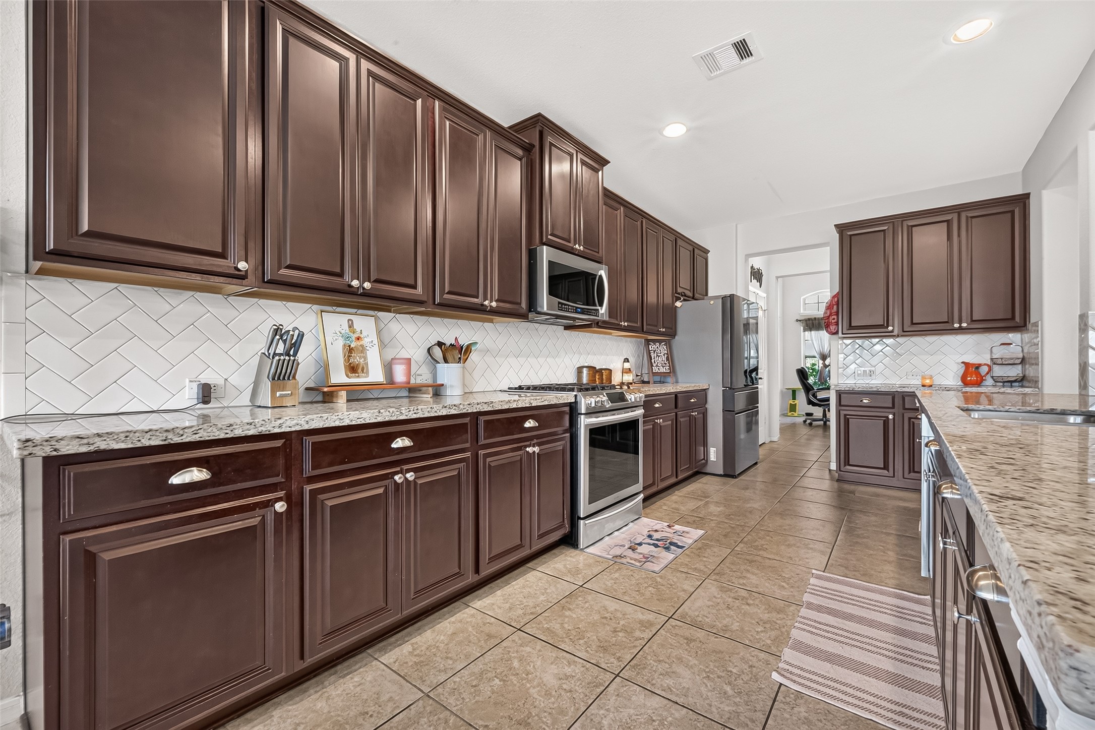 A galley-style layout provides generous cabinet storage and preparation space.