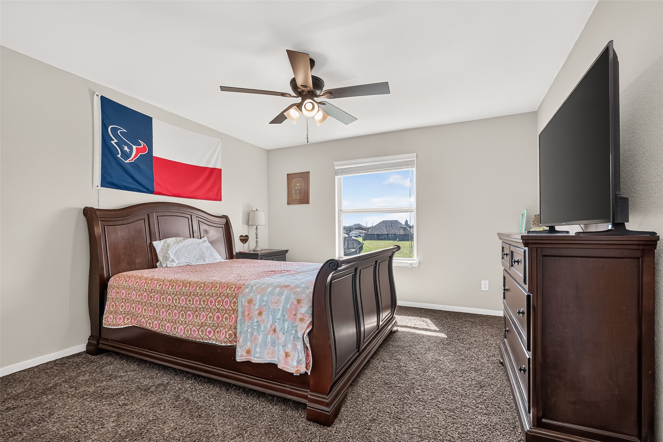 Comfortable proportions make this secondary bedroom easy to arrange.