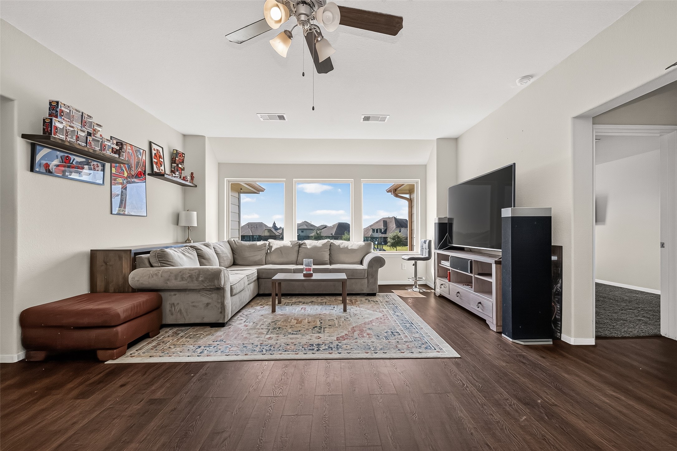 A spacious second living area provides room for movie nights, games, or relaxing.