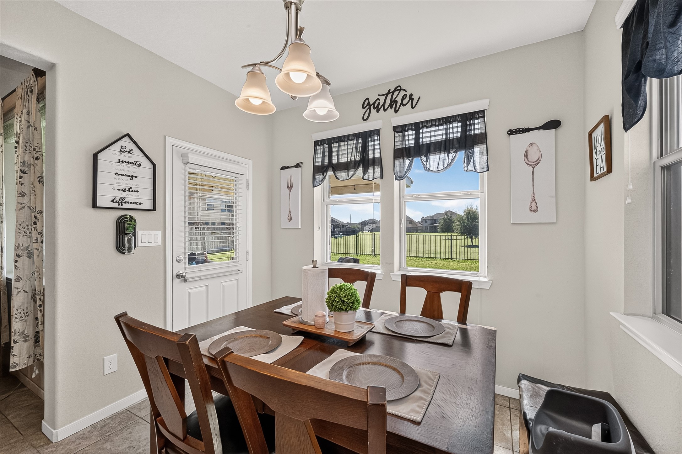 Enjoy everyday meals in the breakfast area beside windows overlooking the outdoor space.
