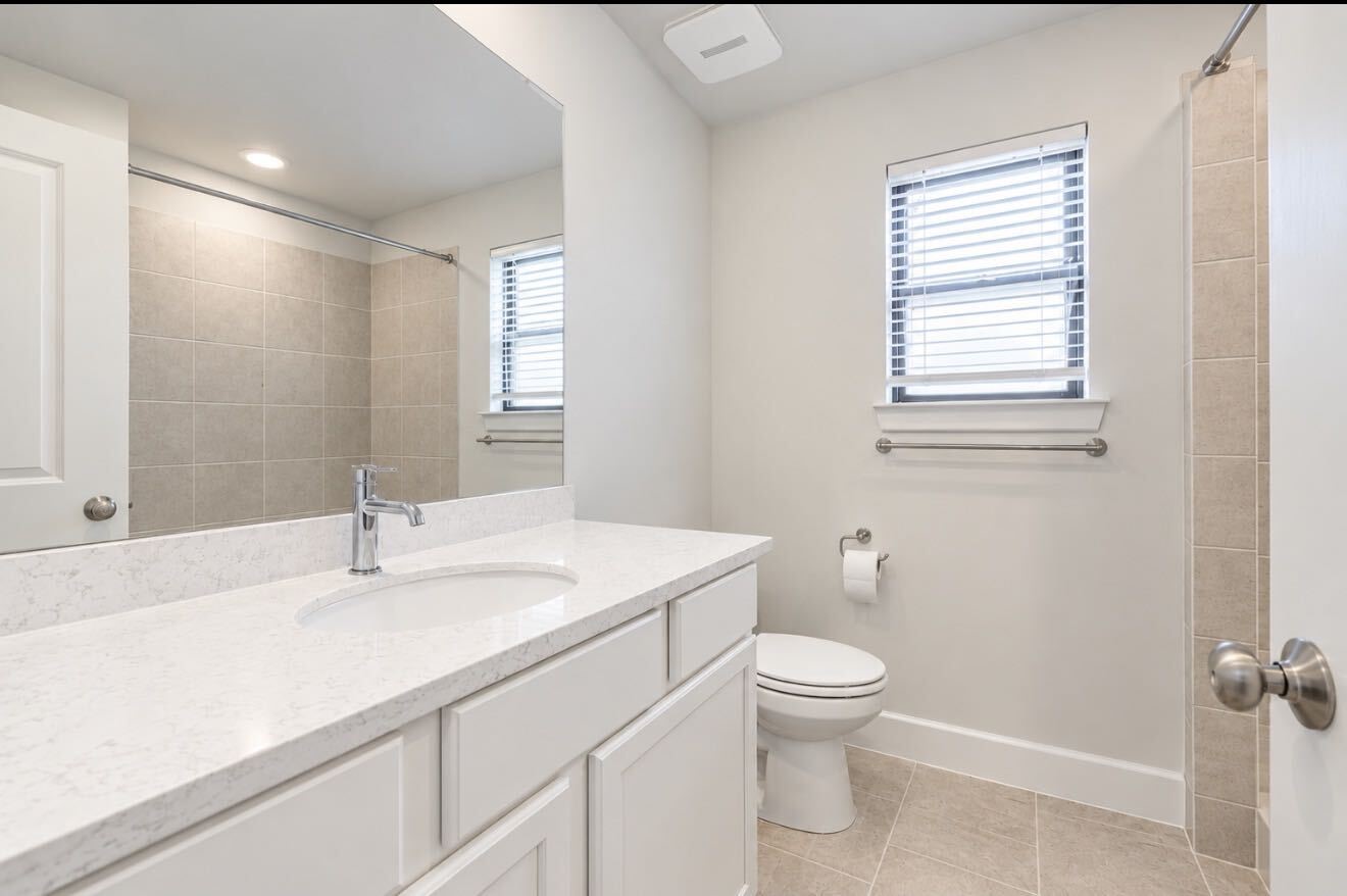 Another secondary bathroom.