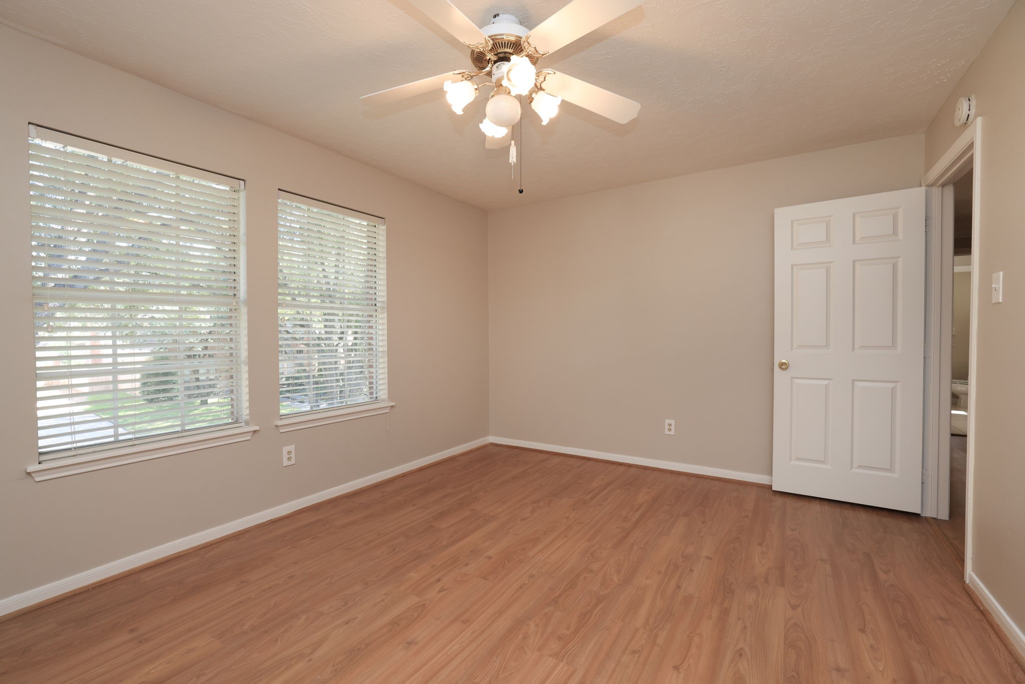 Ample closet space and natural light complete this comfortable upstairs suite.