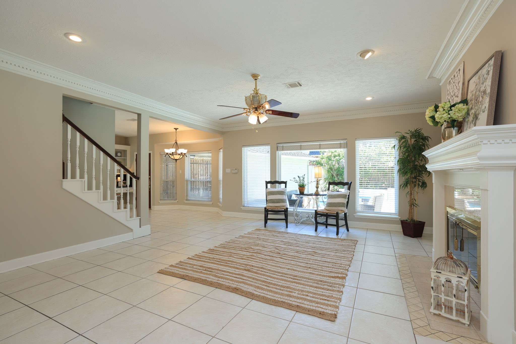 Open-concept design connecting the family room to kitchen and dining spaces for everyday living and entertaining.